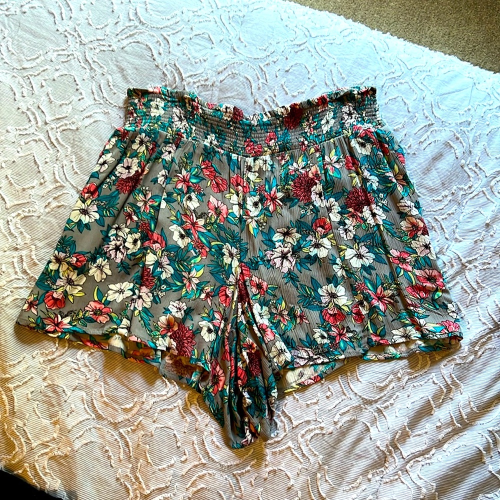 NWT Torrid beautiful light flowing flowered print shirts. 100% rayon size 12